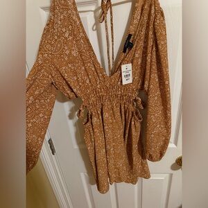 Long sleeve dress with side cut outs